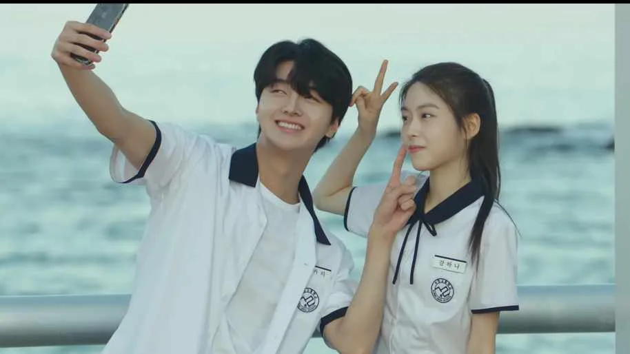 high school couple taking selfie in a korean drama first love 2025