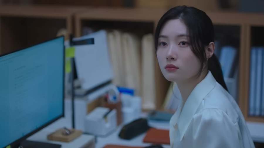 Kang Hyo Min beyond the bar